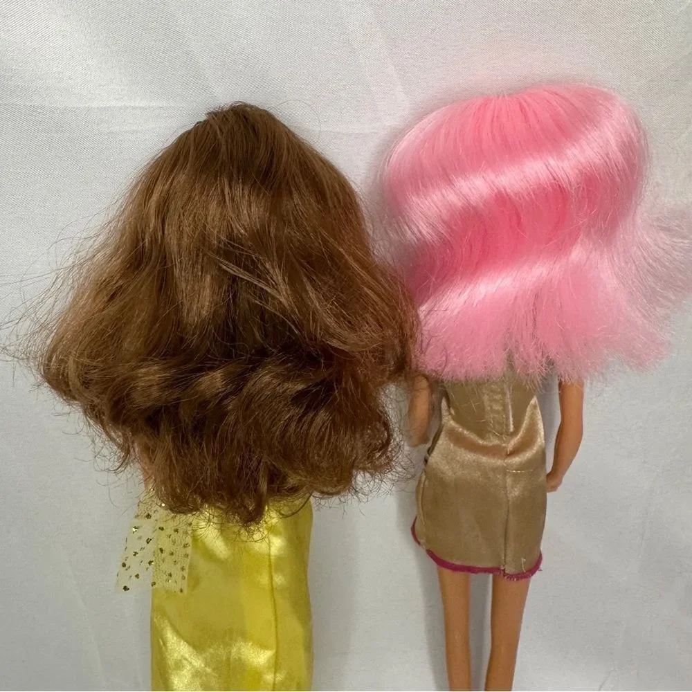 2 Dolls with dresses